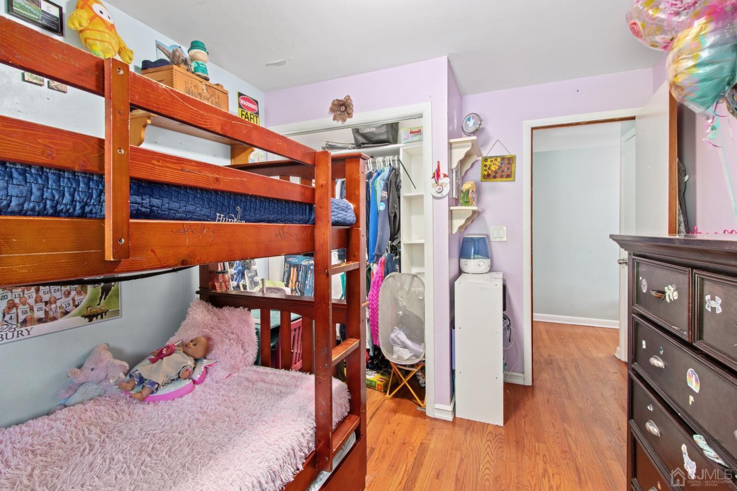 40 Emmans Road Ledgewood, NJ 07852 - Photo 14 of 24 a bedroom with a bed and wooden floor