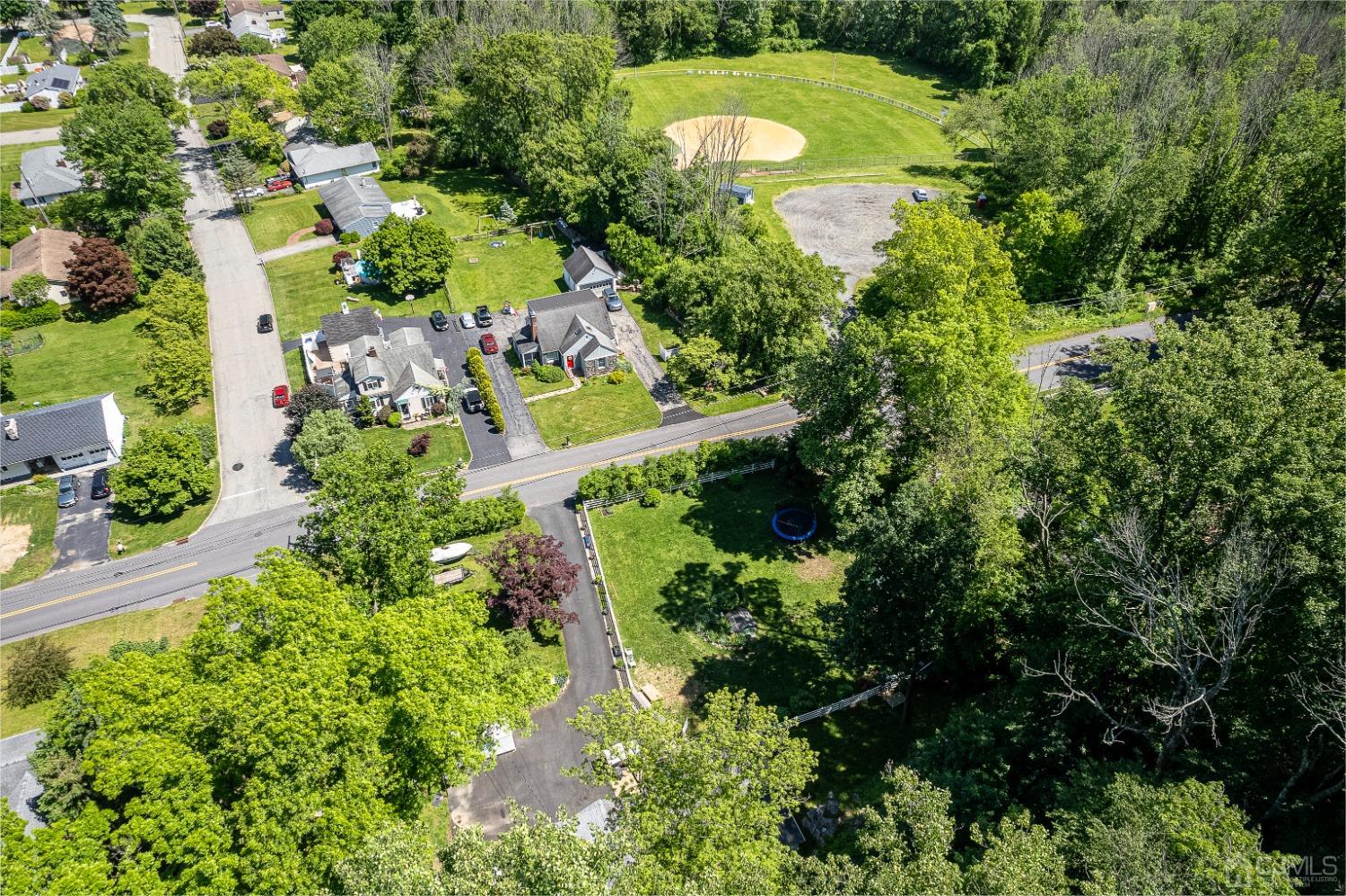 40 Emmans Road Ledgewood, NJ 07852 - Photo 19 of 24 an aerial view of residential house with outdoor space and trees all around