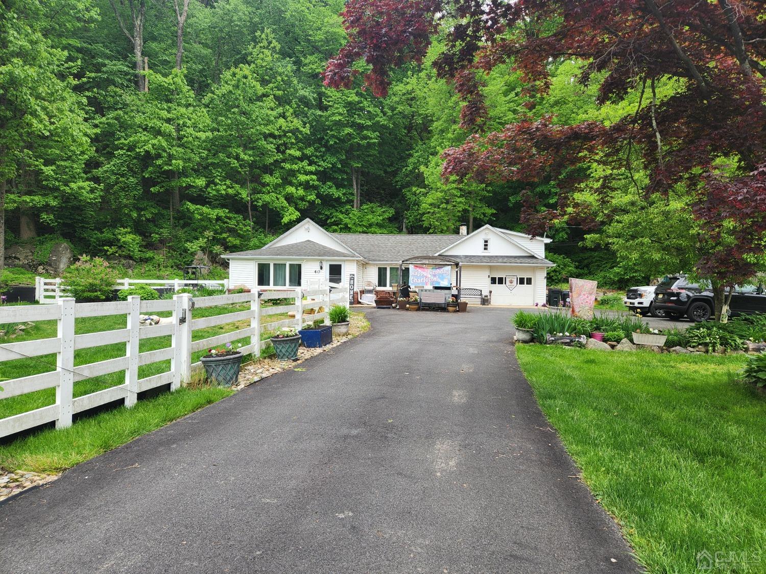 40 Emmans Road Ledgewood, NJ 07852 - Photo 3 of 24 a front view of house with yard and green space
