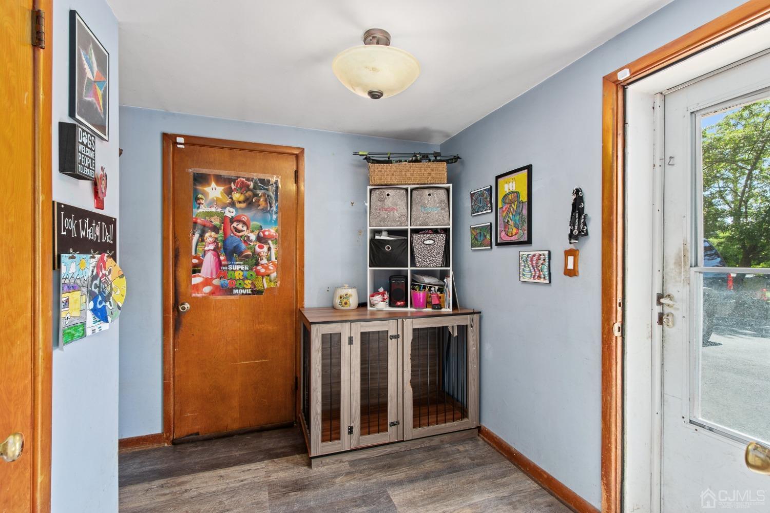 40 Emmans Road Ledgewood, NJ 07852 - Photo 5 of 24 a view of a livingroom with fridge and workspace