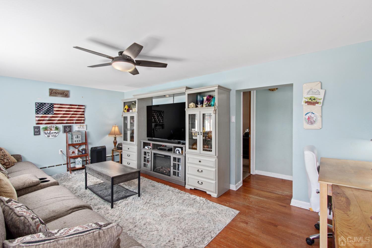 40 Emmans Road Ledgewood, NJ 07852 - Photo 6 of 24 a living room with furniture and a flat screen tv