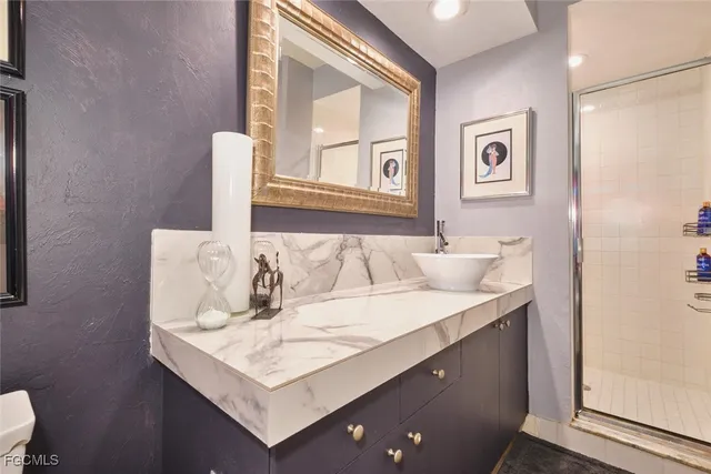 a living room with a sink and a mirror