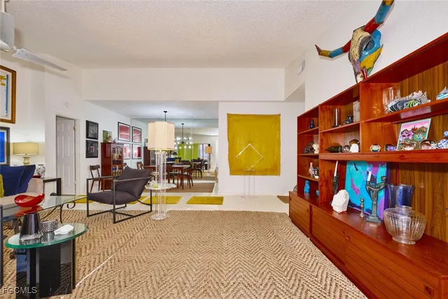 a bed room with furniture and a rug