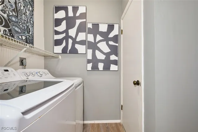 a utility room with dryer and washer