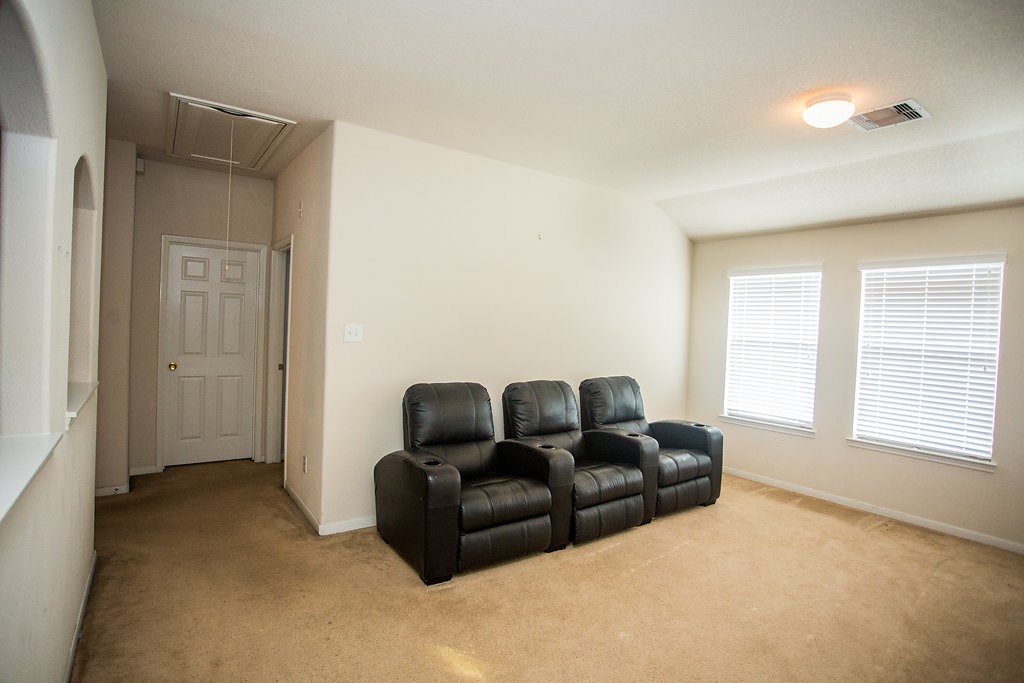 2930 Westerfield Lane Houston, TX 77084 - Photo 19 of 22 View of game room and doorway to two bedrooms.