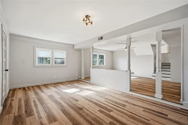 a view of an empty room and window