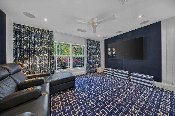 a living room with a couch and a flat screen tv