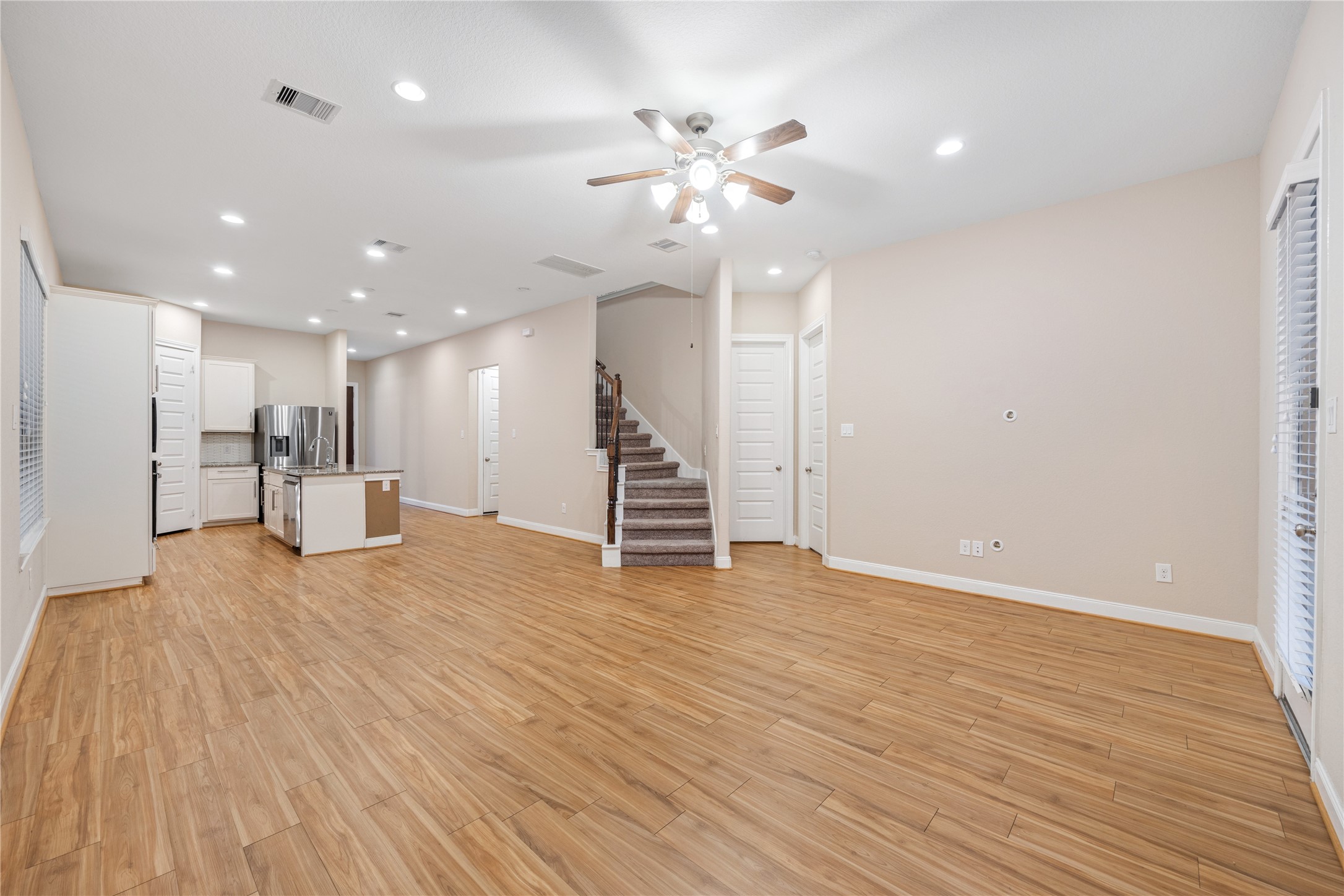 10408 Quiet Courtyard Road Houston, TX 77043 - Photo 8 of 24 Spacious living room with an open layout and natural light.