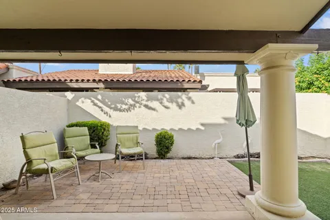 a picture of a table and chairs in patio
