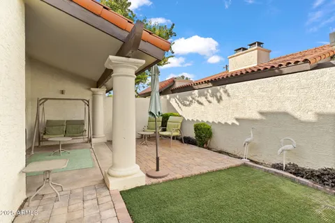 a view of a porch with a yard