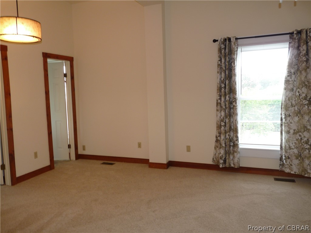 1379 Centerville Road Shacklefords, VA 23156 - Photo 17 of 30 Very large master bedroom with large walk-in closet and full bath