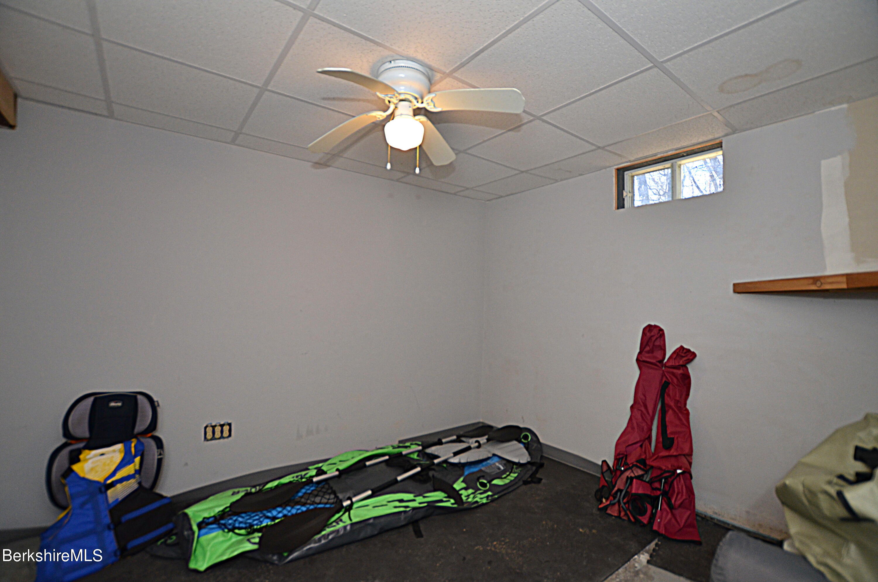 95 Middlefield Road Peru, MA 01235 - Photo 32 of 39 a room with toys and wooden floor
