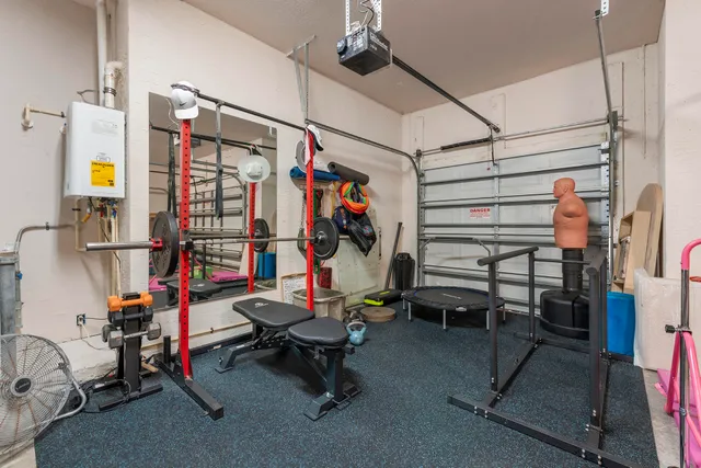 a view of a swimming pool with a table and chairs