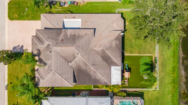 a view of a park with swings and slides