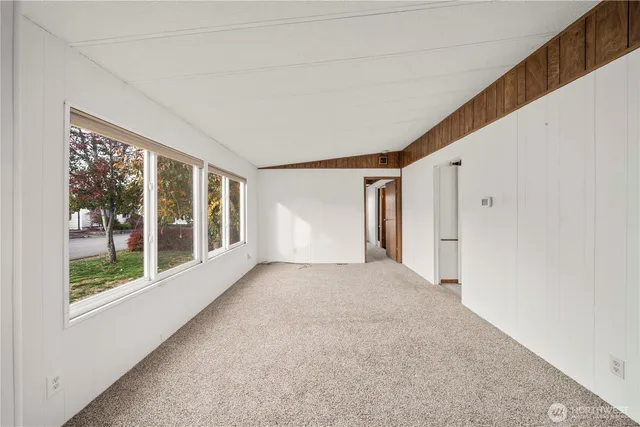 an empty room with fan