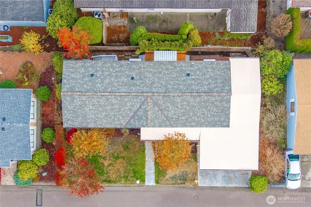 an aerial view of houses with outdoor space