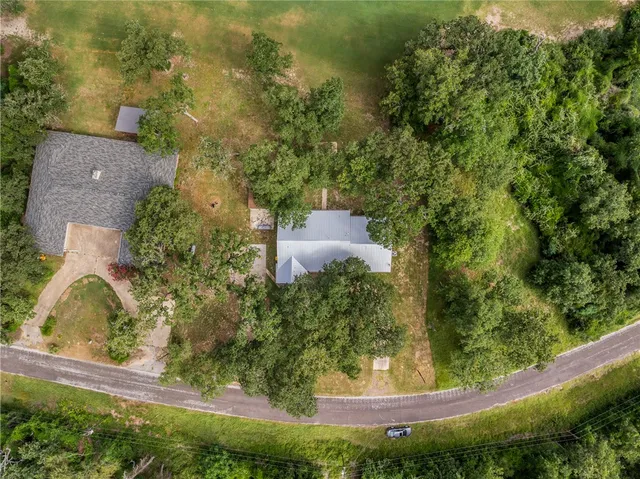a house view with a garden space