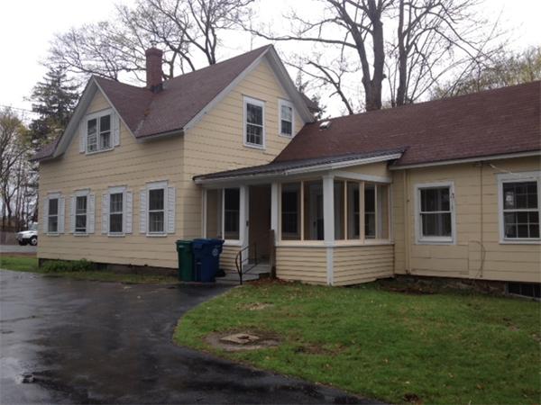 382 Boston Road Billerica, MA 01821 - Photo 1 of 17 a front view of a house with a yard