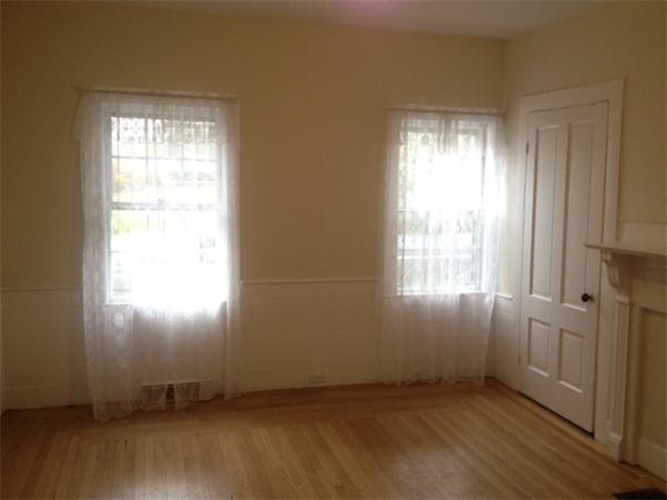 382 Boston Road Billerica, MA 01821 - Photo 11 of 17 an empty room with wooden floor and windows