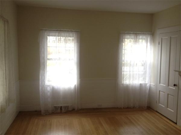 382 Boston Road Billerica, MA 01821 - Photo 13 of 17 an empty room with wooden floor and windows