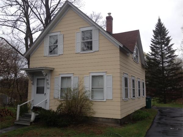 382 Boston Road Billerica, MA 01821 - Photo 2 of 17 a front view of a house with a yard