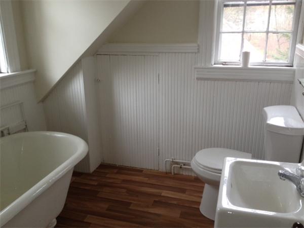 382 Boston Road Billerica, MA 01821 - Photo 7 of 17 a bathroom with a sink and a toilet