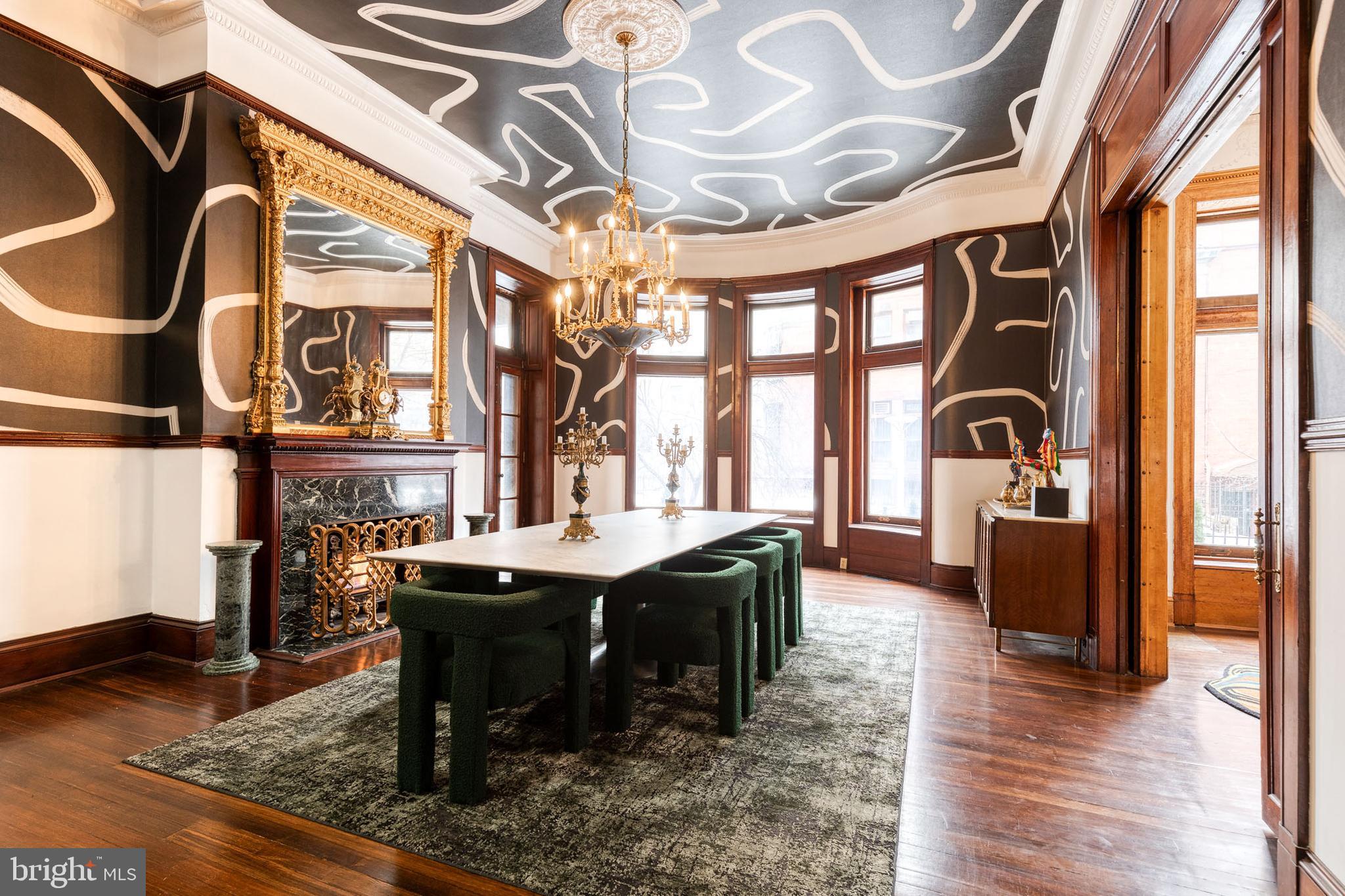 2452 Eutaw Place Baltimore, MD 21217 - Photo 14 of 75 a view of a dining room with furniture window and wooden floor