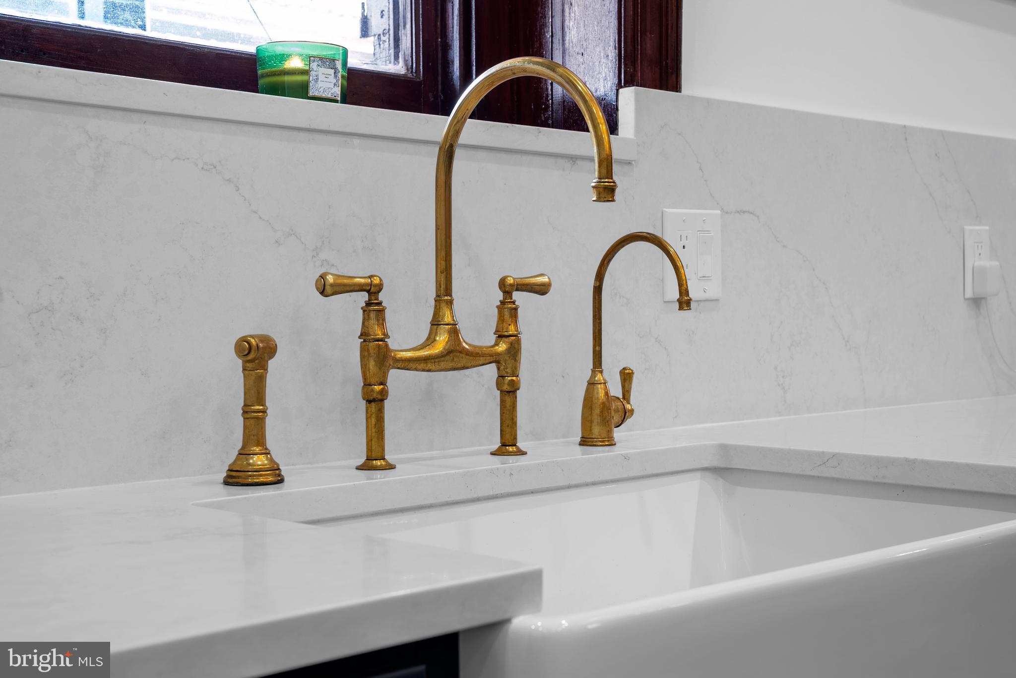 2452 Eutaw Place Baltimore, MD 21217 - Photo 22 of 75 a close view of sink and tap