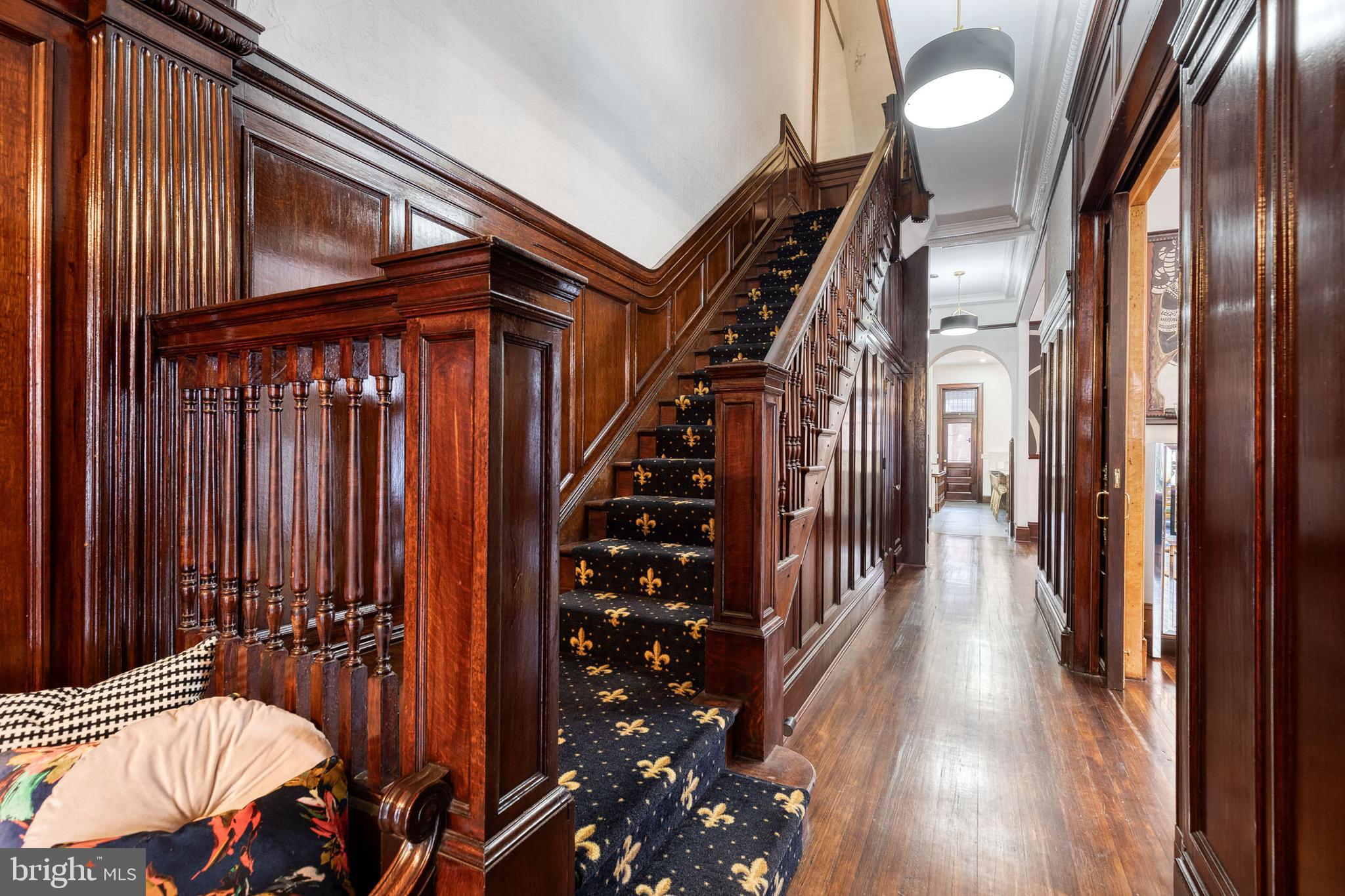 2452 Eutaw Place Baltimore, MD 21217 - Photo 32 of 75 a view of entryway and hall with wooden floor