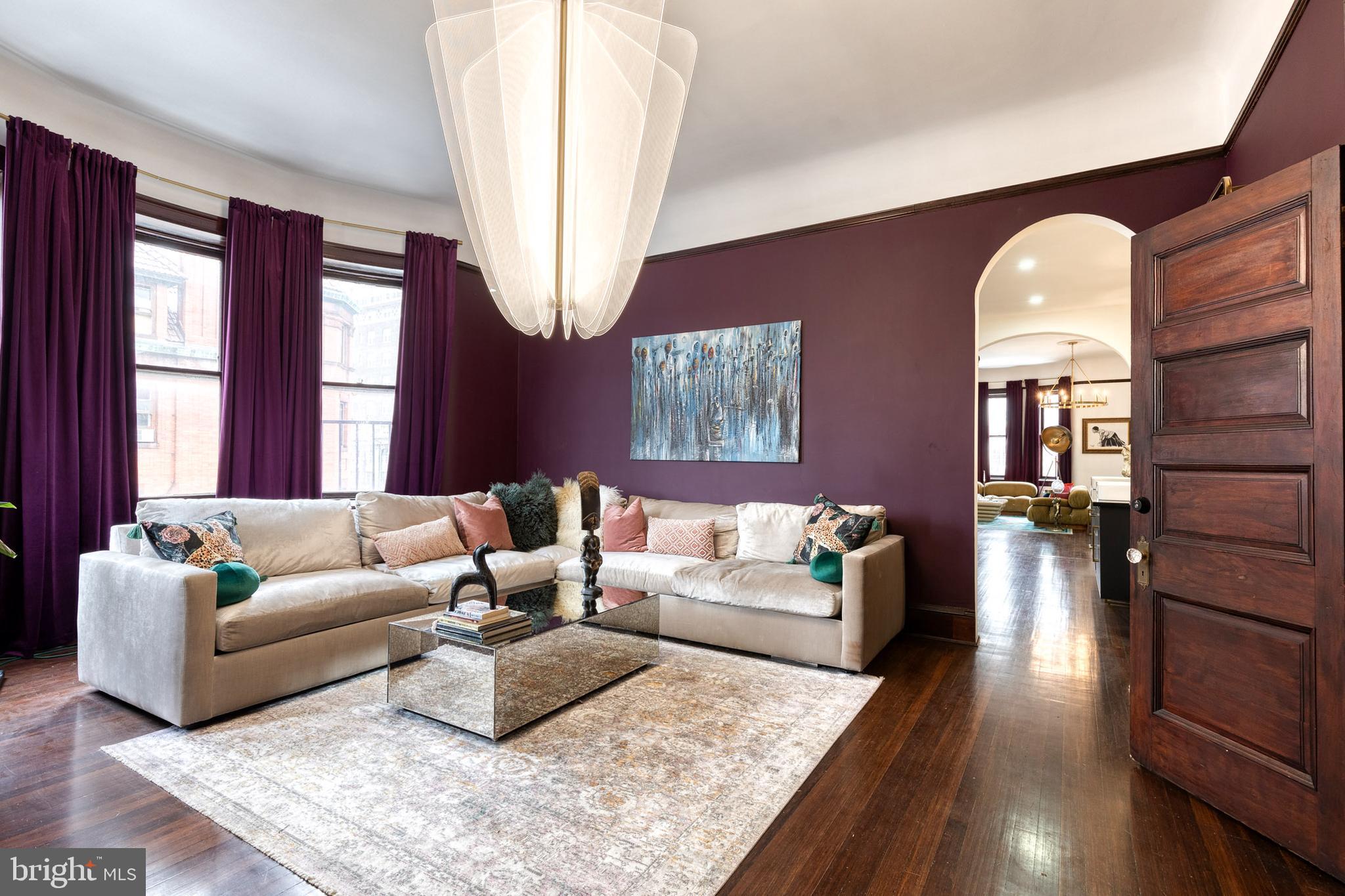 2452 Eutaw Place Baltimore, MD 21217 - Photo 36 of 75 a living room with furniture and a large window