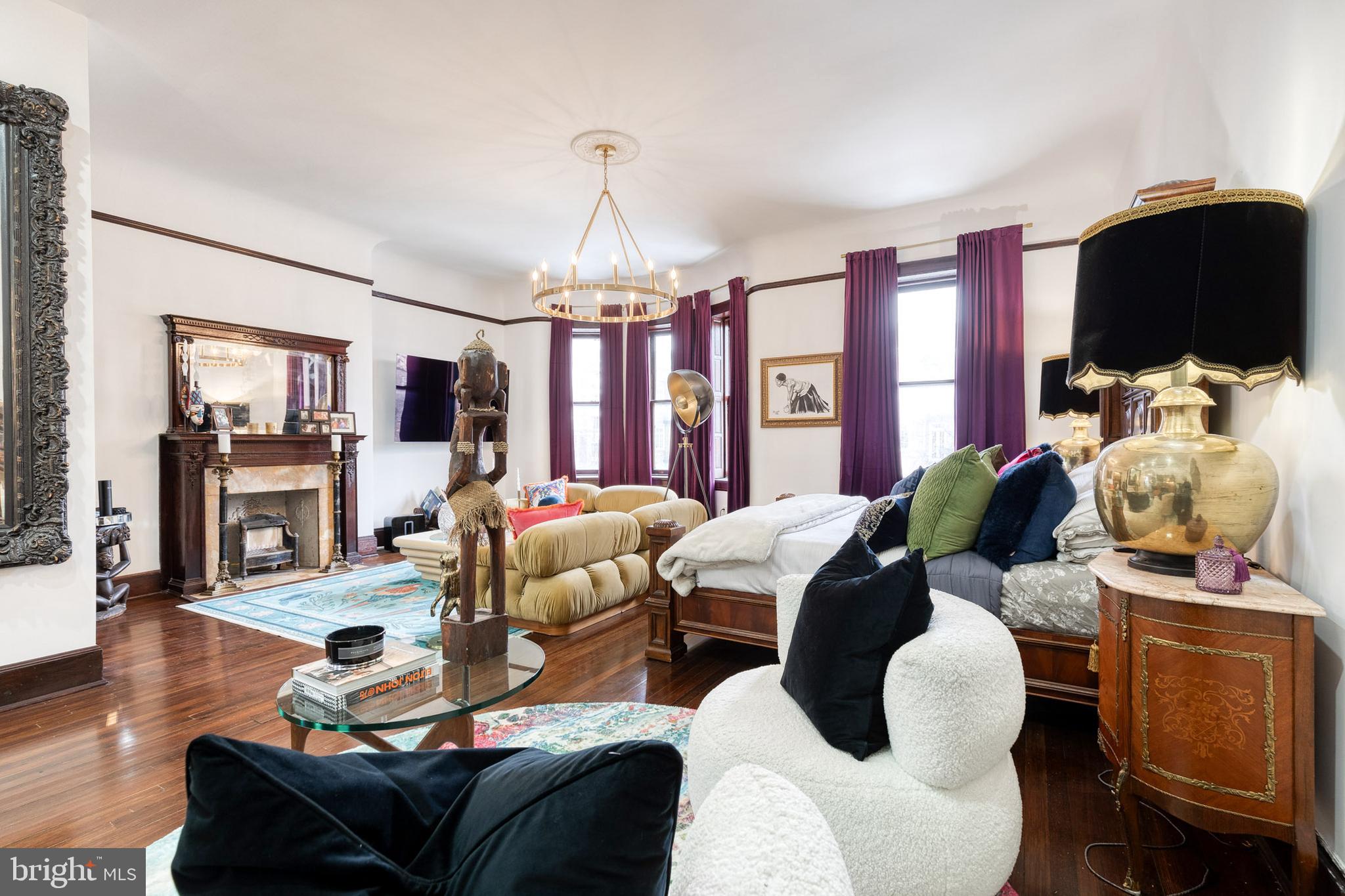2452 Eutaw Place Baltimore, MD 21217 - Photo 52 of 75 a living room with furniture fireplace and flat screen tv