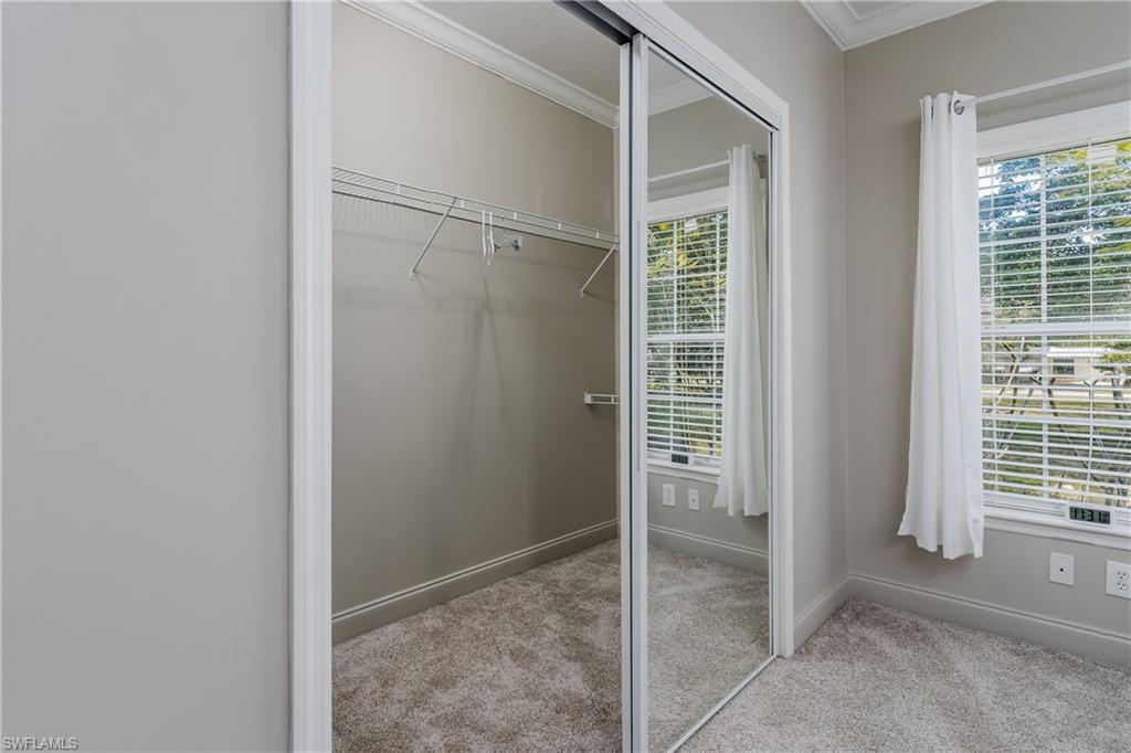 104 Rookery Road Naples, FL 34114 - Photo 13 of 32 a view of entryway with a ceiling fan