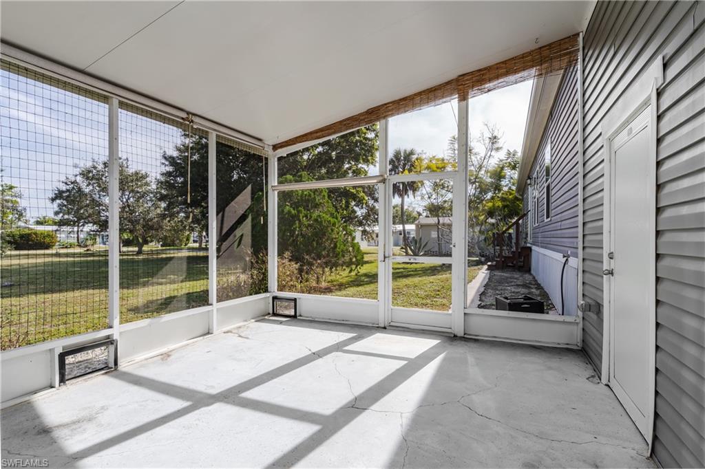 104 Rookery Road Naples, FL 34114 - Photo 26 of 32 a building outdoor space with seating