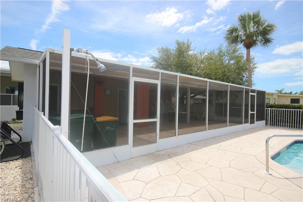 104 Rookery Road Naples, FL 34114 - Photo 30 of 32 a view of balcony with a potted plant