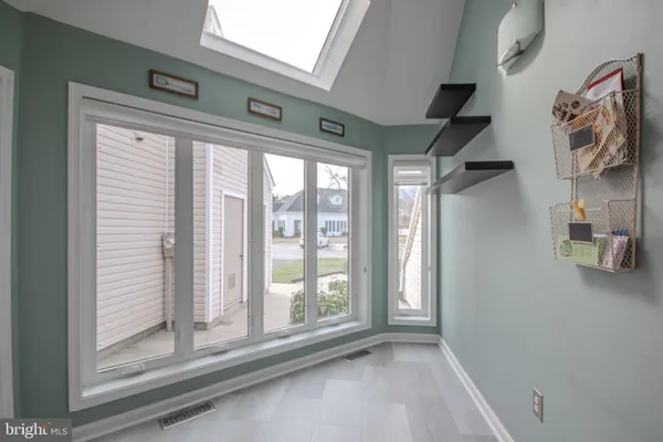 a view of entry way with wooden floor