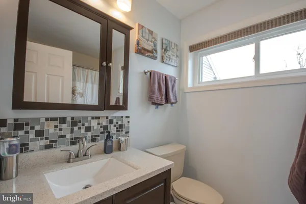 a view of a balcony with an ocean view