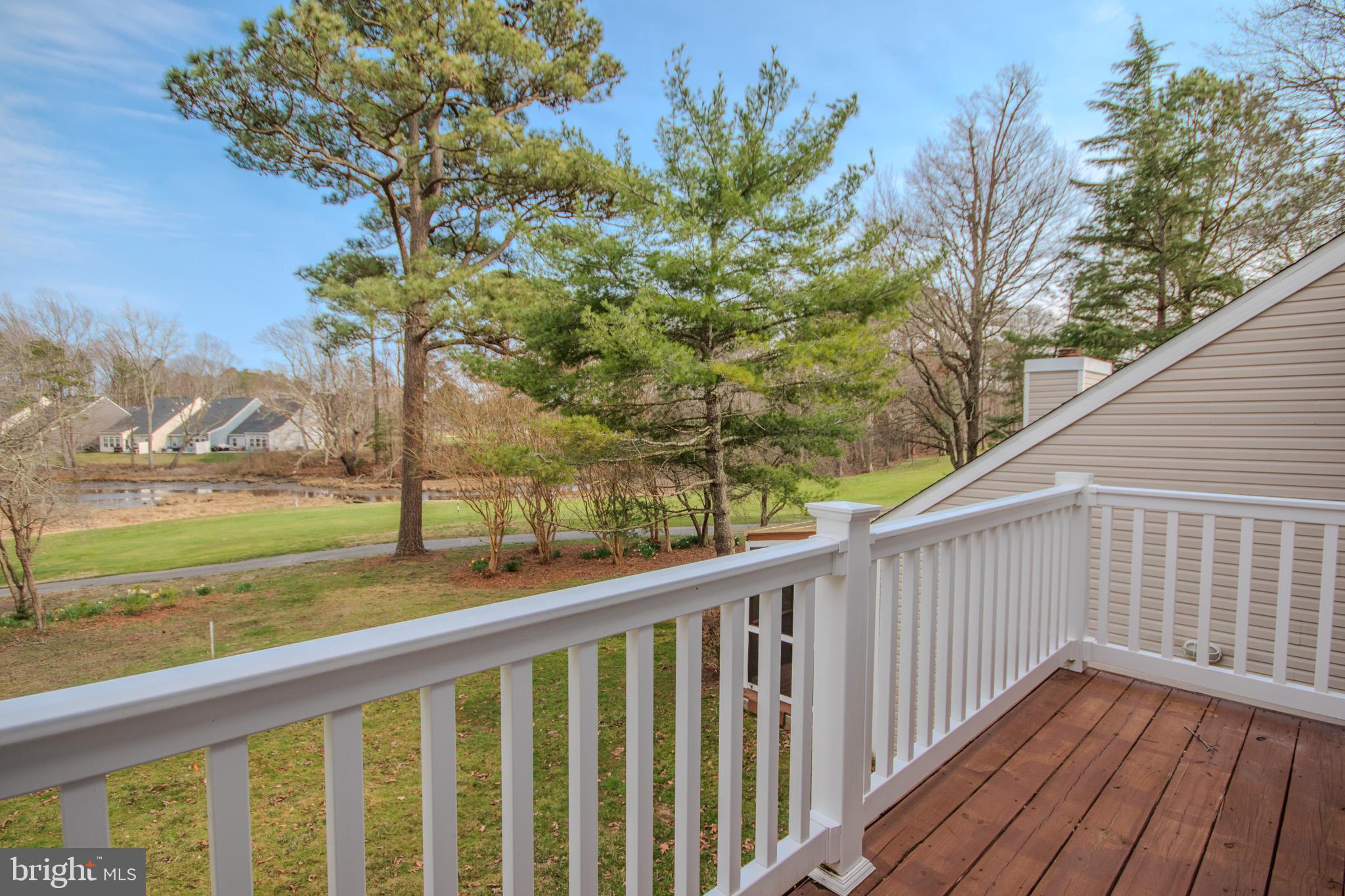 11610 Masters Lane, Unit 115 Berlin, MD 21811 - Photo 20 of 46 a view of a balcony with an ocean view