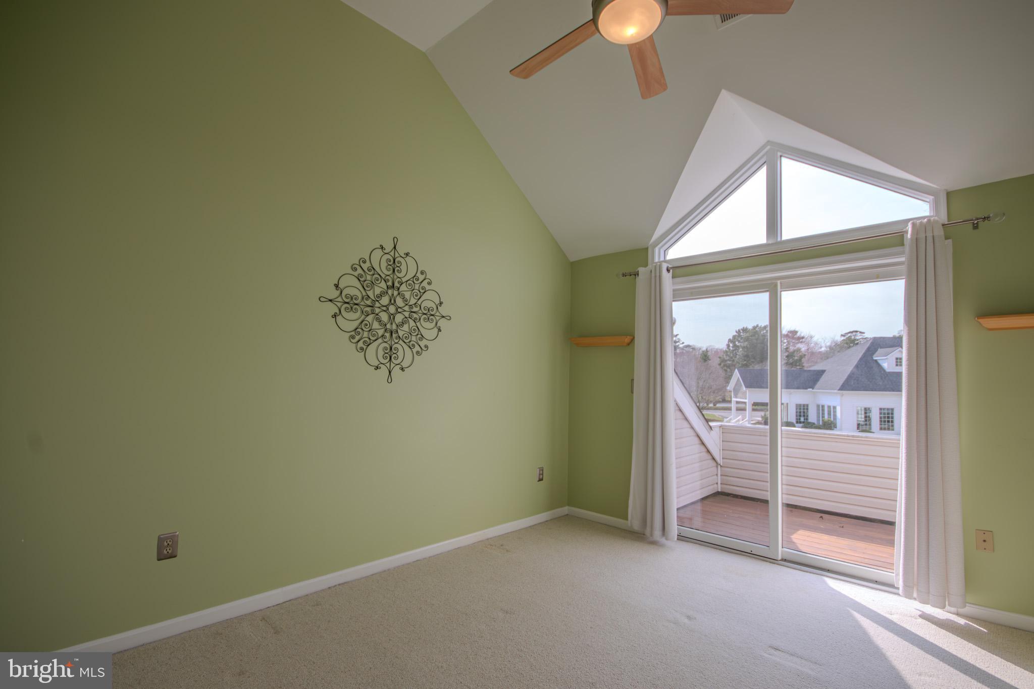 11610 Masters Lane, Unit 115 Berlin, MD 21811 - Photo 23 of 46 an empty room with a window