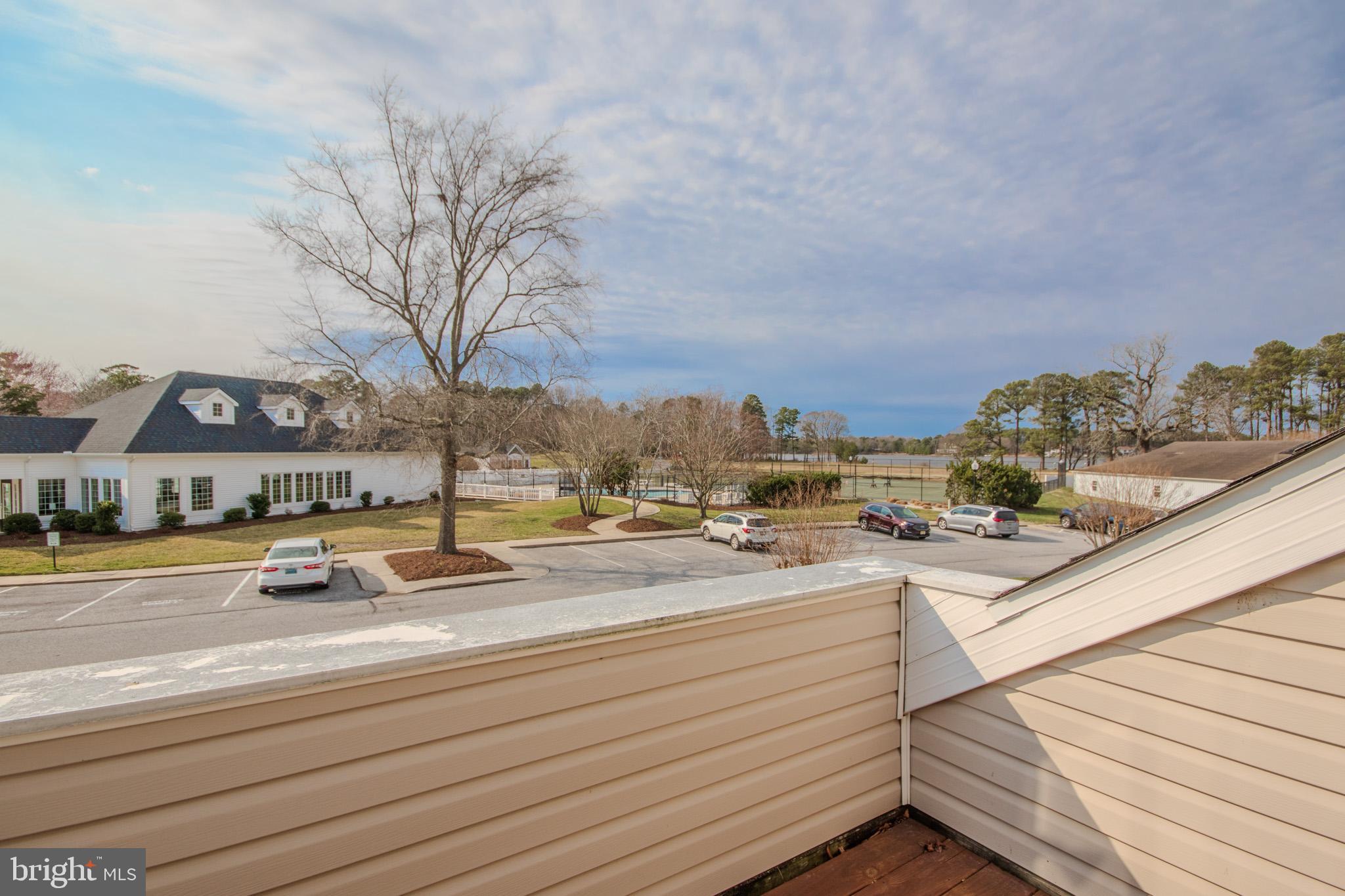 11610 Masters Lane, Unit 115 Berlin, MD 21811 - Photo 26 of 46 a view of a street with houses