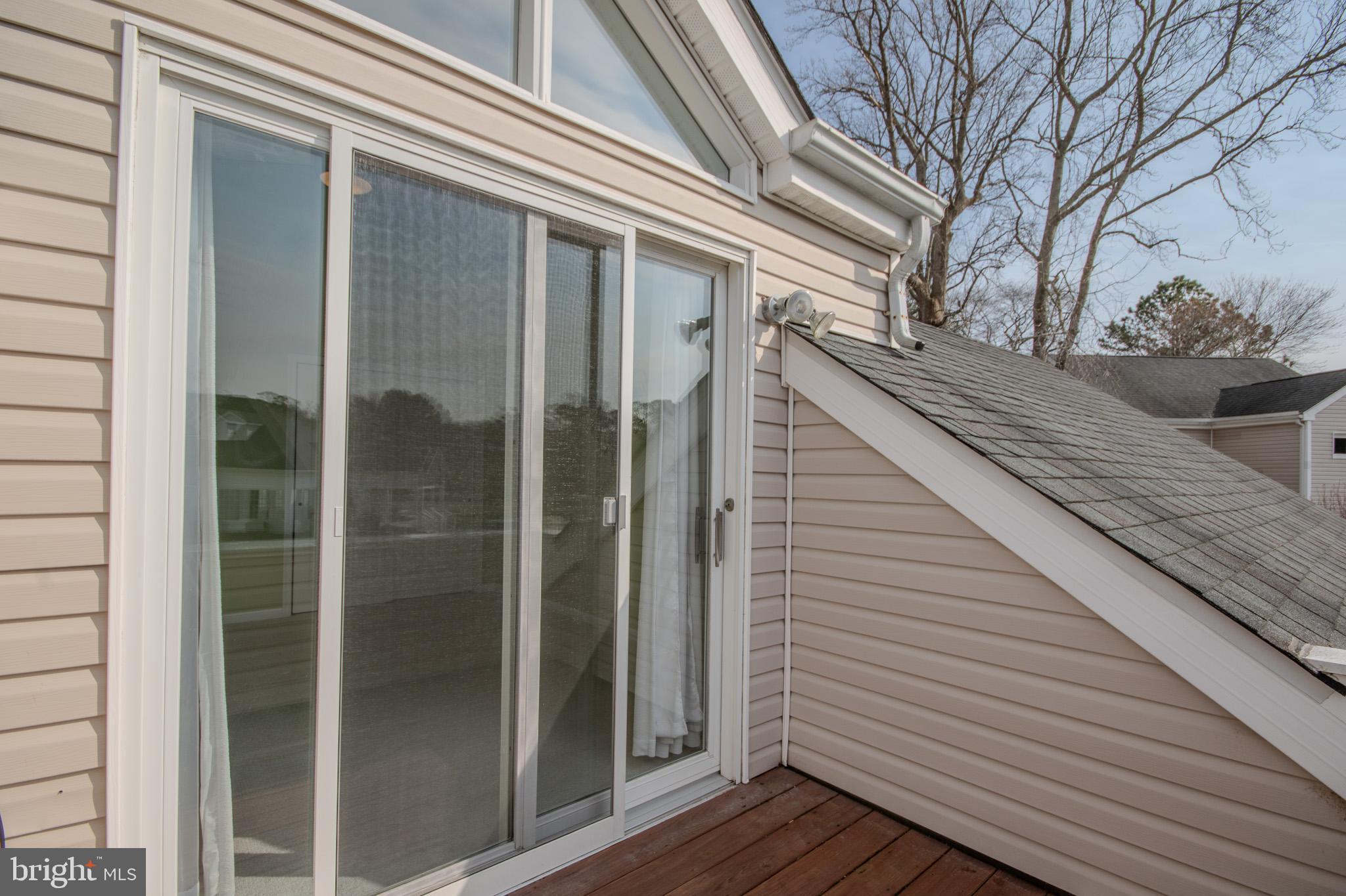 11610 Masters Lane, Unit 115 Berlin, MD 21811 - Photo 27 of 46 a view of a door of the house