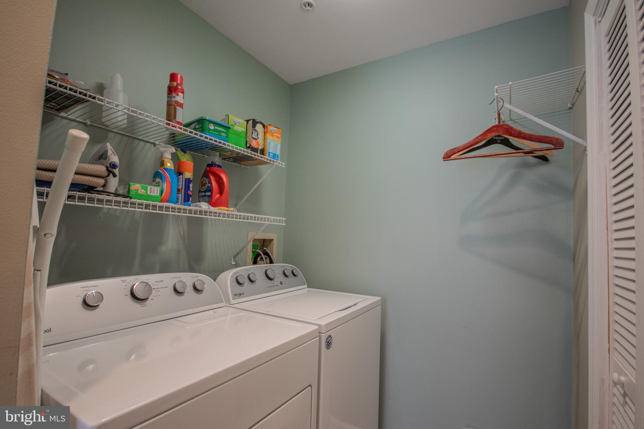 11610 Masters Lane, Unit 115 Berlin, MD 21811 - Photo 32 of 46 a utility room with dryer and washer