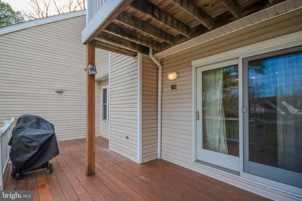 a view of a two chairs on the roof deck