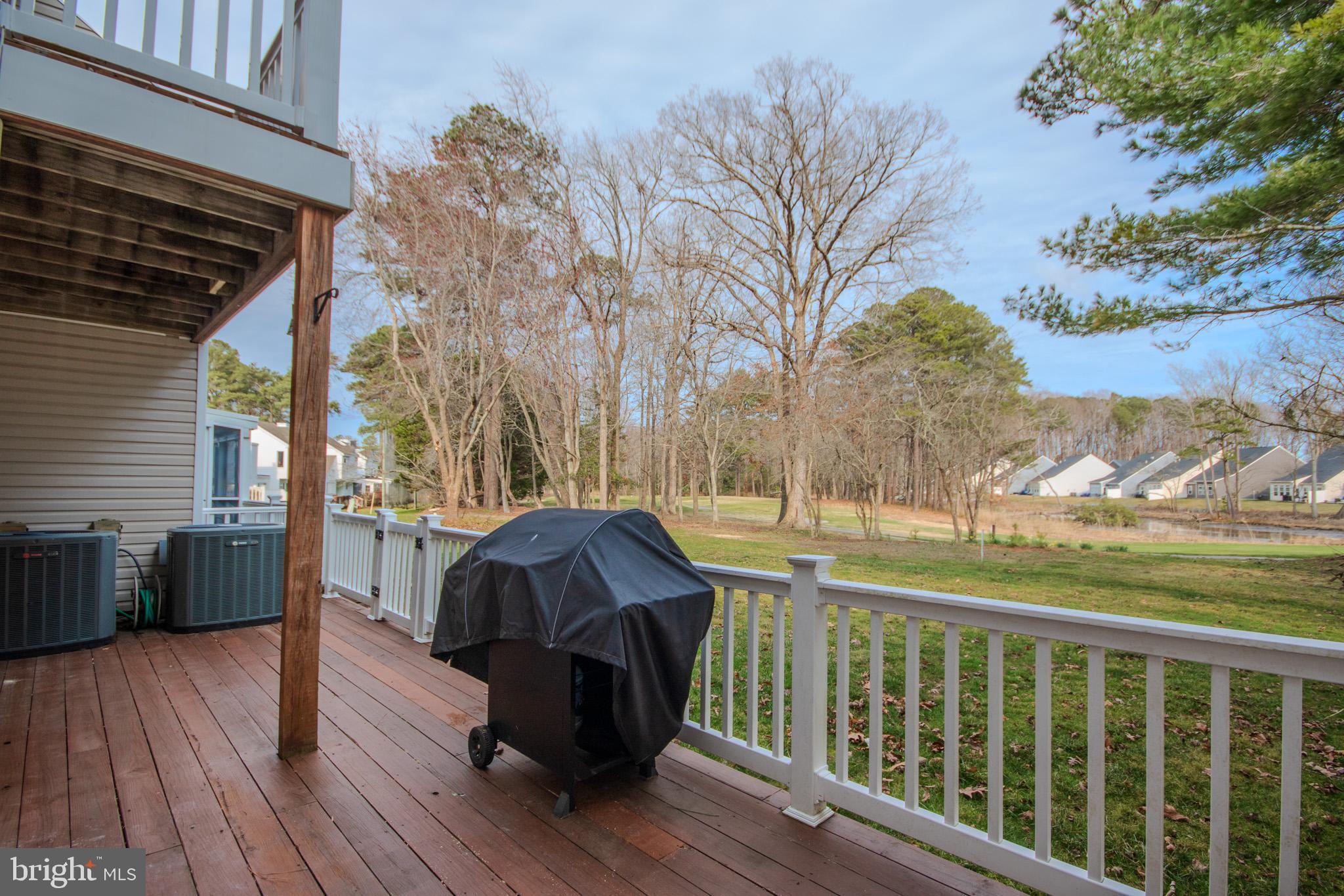 11610 Masters Lane, Unit 115 Berlin, MD 21811 - Photo 35 of 46 a view of a two chairs on the roof deck