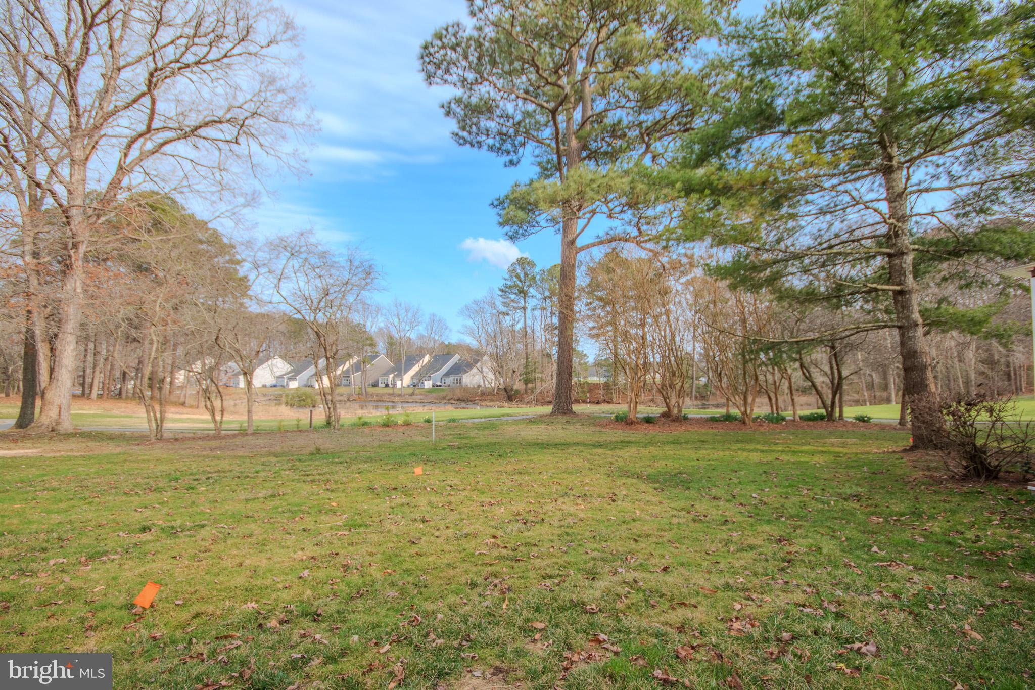 11610 Masters Lane, Unit 115 Berlin, MD 21811 - Photo 38 of 46 a view of a field with an trees
