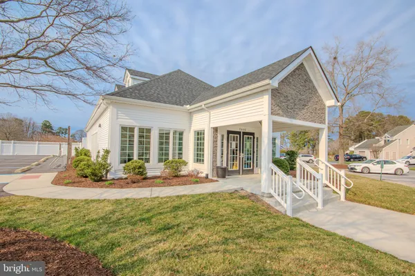 a view of outdoor space with signage and flags