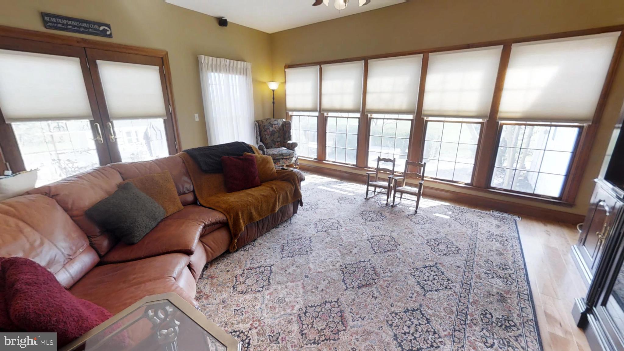 Living Room - wood floors, lots of light!
