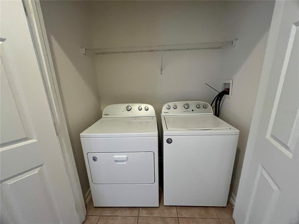 588 Brantley Terrace Way, Unit 309 Altamonte Springs, FL 32714 - Photo 17 of 17 a utility room with dryer and washer