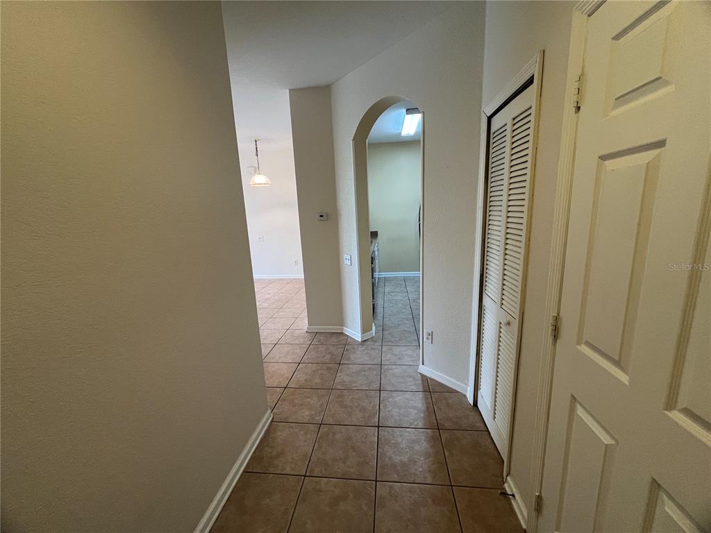 588 Brantley Terrace Way, Unit 309 Altamonte Springs, FL 32714 - Photo 4 of 17 a view of a bathroom from a hallway