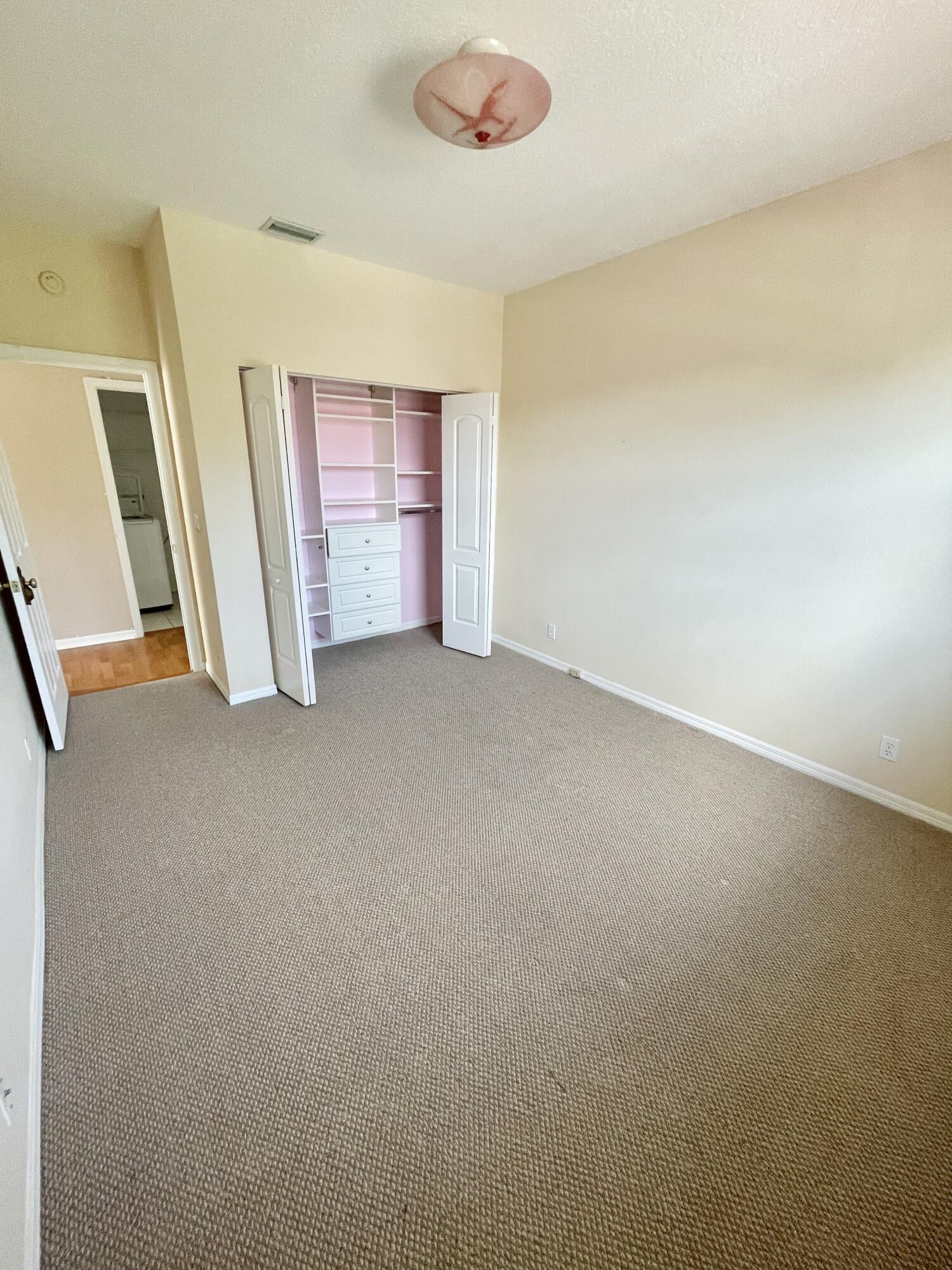 8550 Vía Romana, Unit 2 Boca Raton, FL 33496 - Photo 23 of 28 an empty room with window