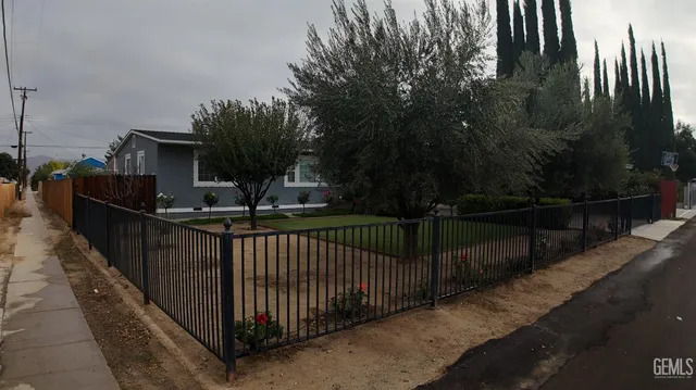 a view of balcony and yard